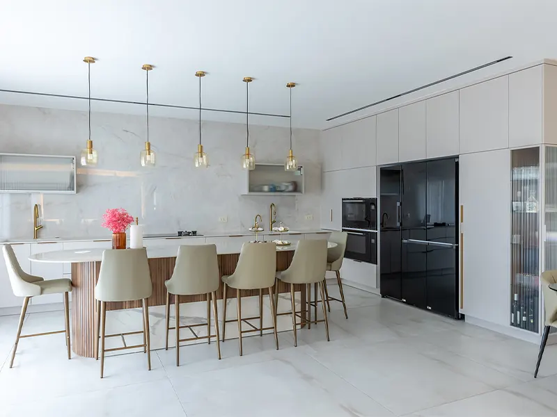 Modern kitchen installation with island and pendant lights
